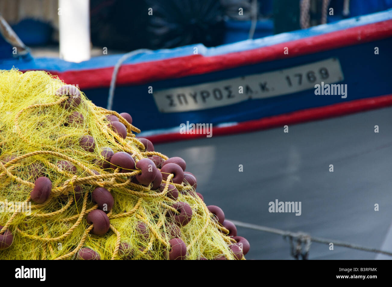 Close up of Fishing Nets and Greek Fishing Boat, Corfu, Greece Stock Photo