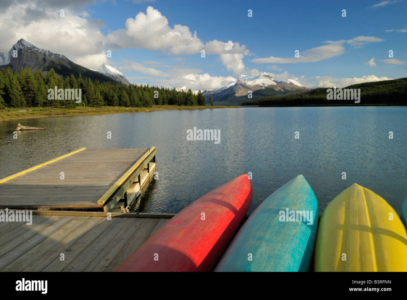 Canoes on a dock on Maligne Lake, Jasper National Park in Canada Stock Photo