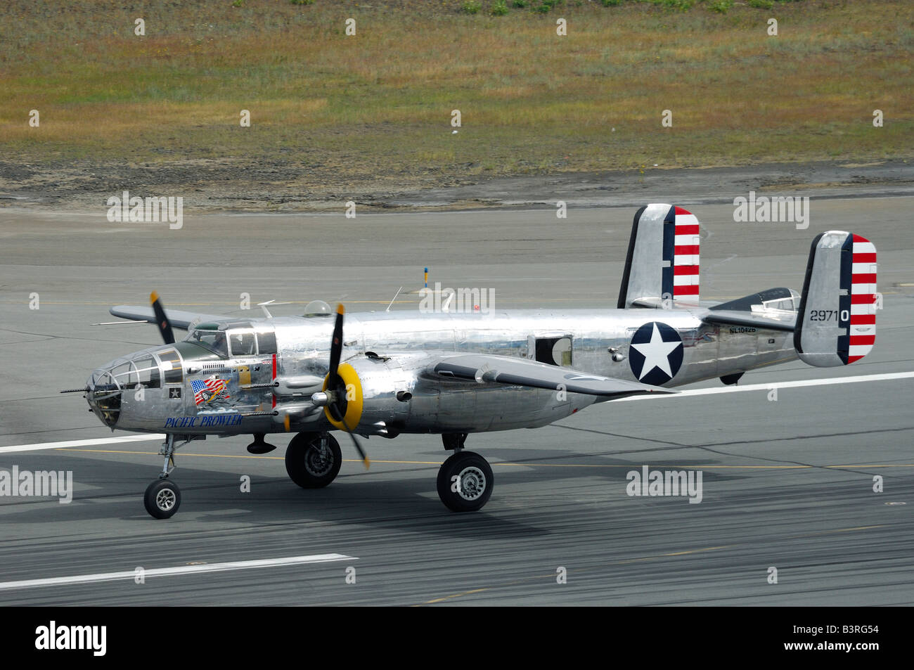 Old WWII bomber plane North American B-25 J Mitchell on runway  during an air show, Anchorage, Alaska, Usa Stock Photo