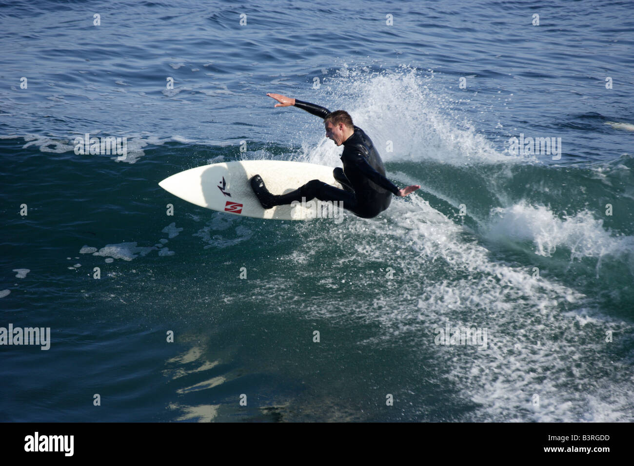 A surfer at world famous Steamer Lane in Santa Cruz California