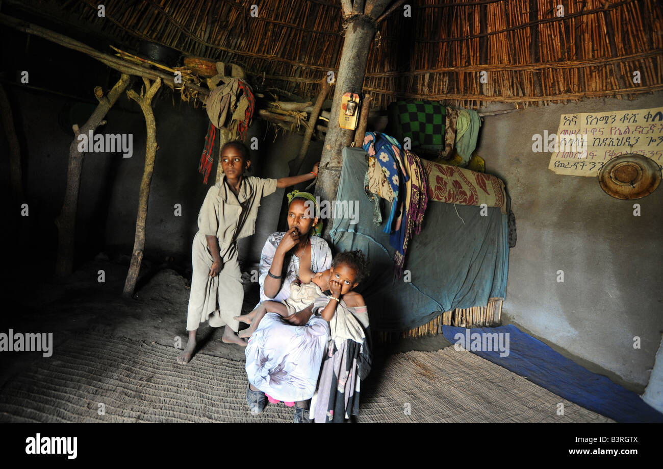 Workenish Jemal and her two children  at her home in Mareko Woreda Southern Ethiopia Stock Photo