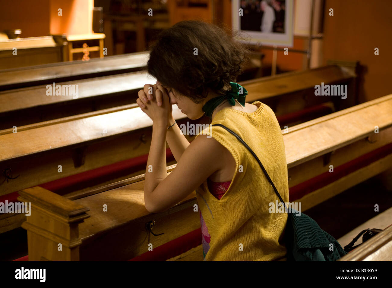 Young woman praying Catholic church Zielona Gora, Poland, Europe Stock ...