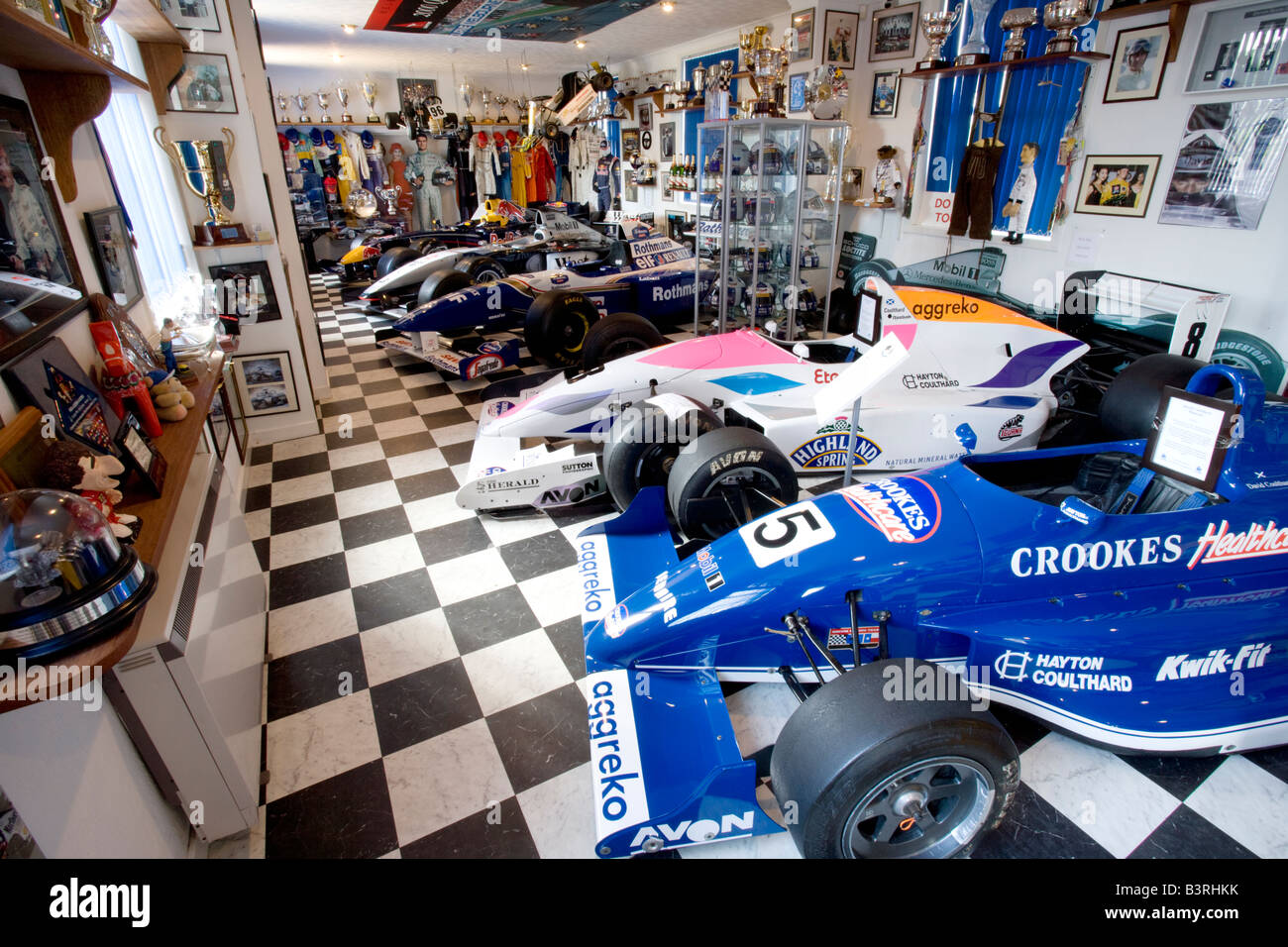 Formula One racing cars inside the David Coulthard Museum at Twynholm Galloway Scotland UK Stock Photo
