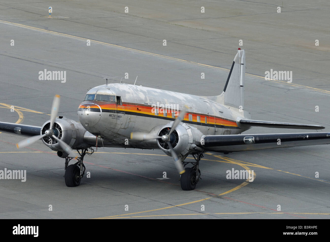 Old airplane Douglas DC-3 Dakota running on the taxiway during the Arctic Thunder airshow 2008 - Anchorage - Alaska – USA Stock Photo