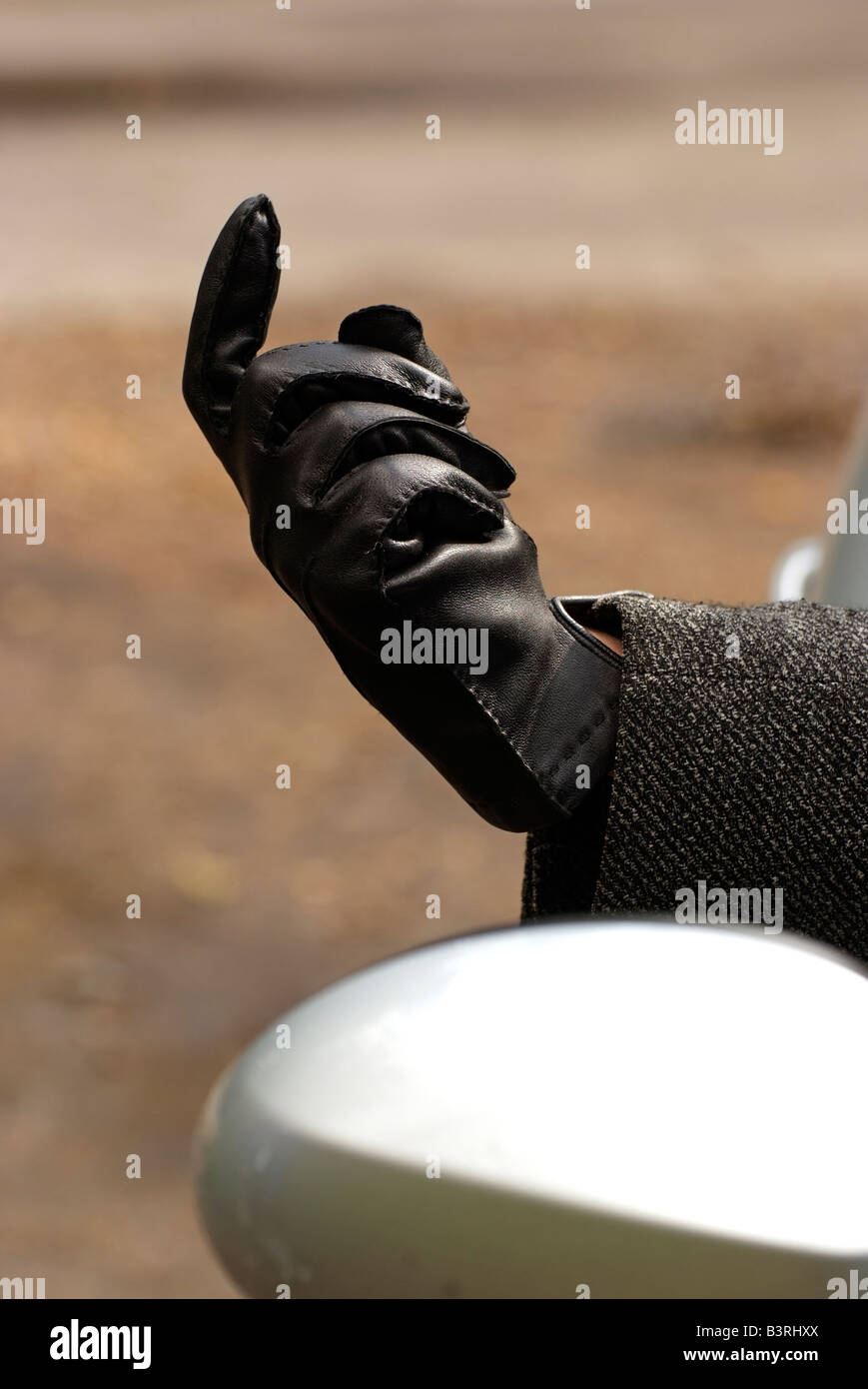 leather gloved hand