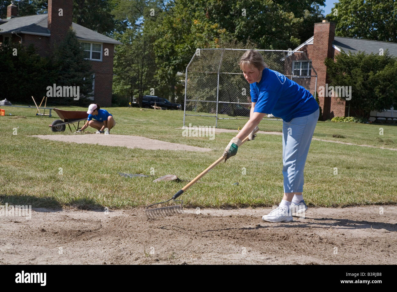 Volunteers Build Baseball Diamond at Children's Home Stock Photo Alamy