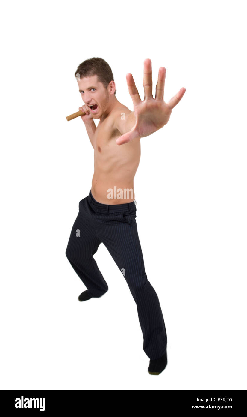 man doing martial arts move on white background Stock Photo Alamy