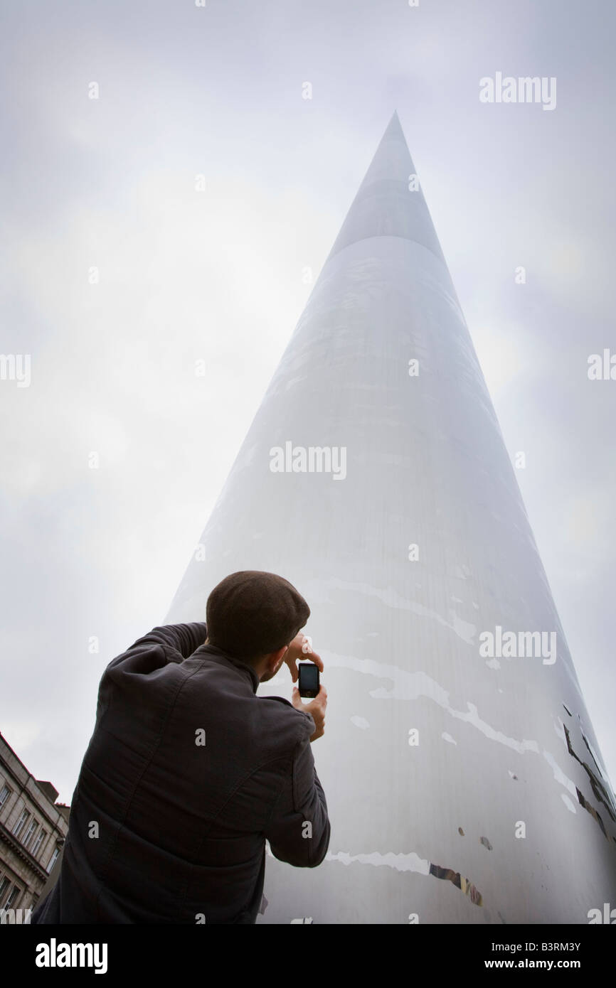 Tourist taking picture of the Spire of Dublin, Dublin, Ireland Stock Photo