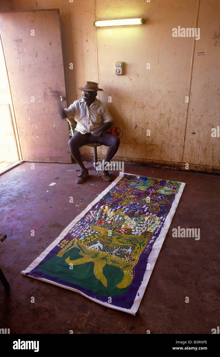 Aboriginal artist and canvas, Australia Stock Photo