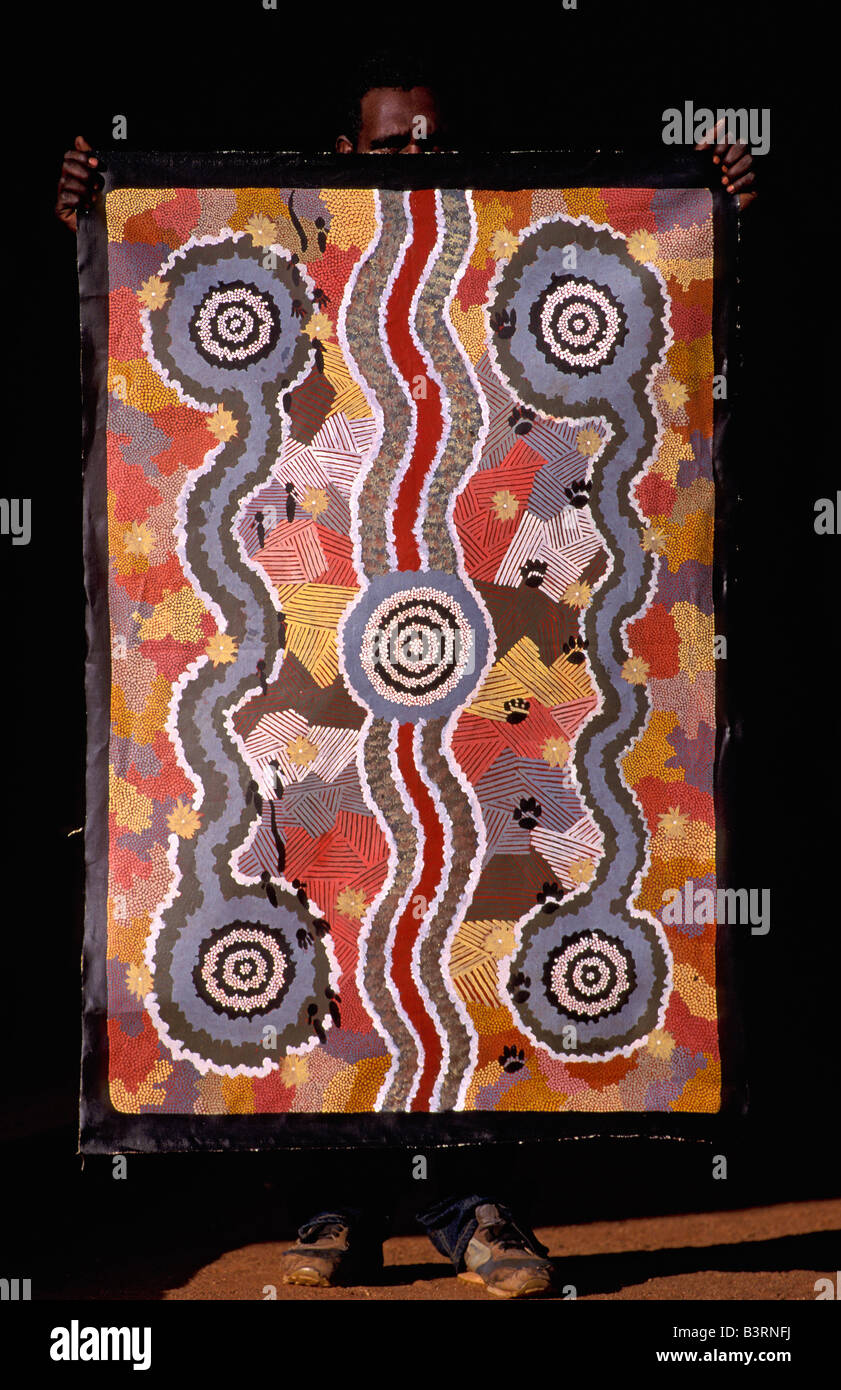 Aboriginal artist and canvas, Australia Stock Photo
