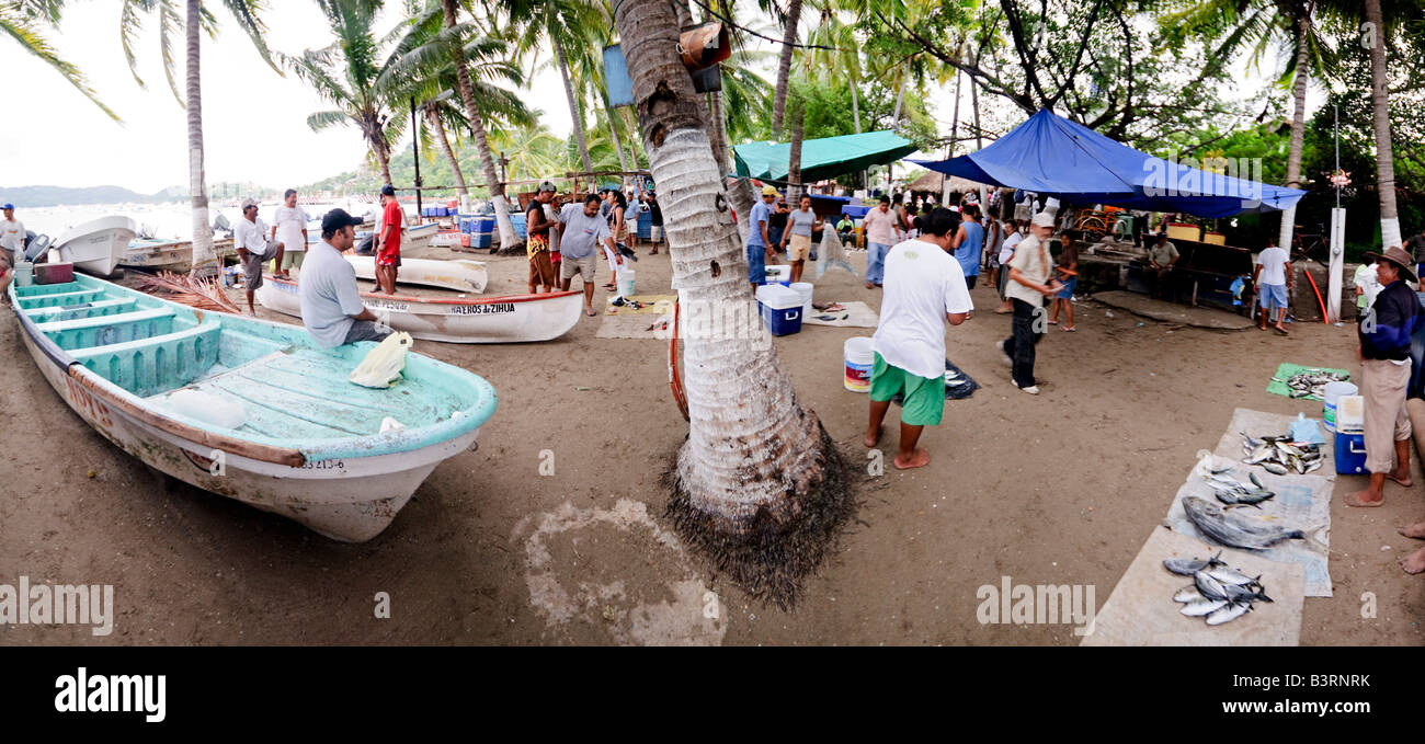The fish market on the beach at Playa Principal Zihuatanejo Mexico