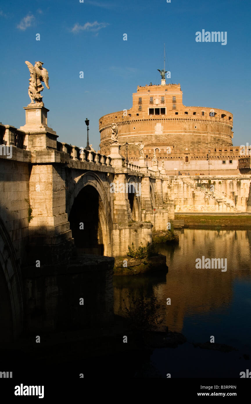 Ponte Sant Angelo bridge over Tiber river with Mausoleum of Hadrian AD 139 also known as Castel Sant’Angelo, Rome Italy Stock Photo