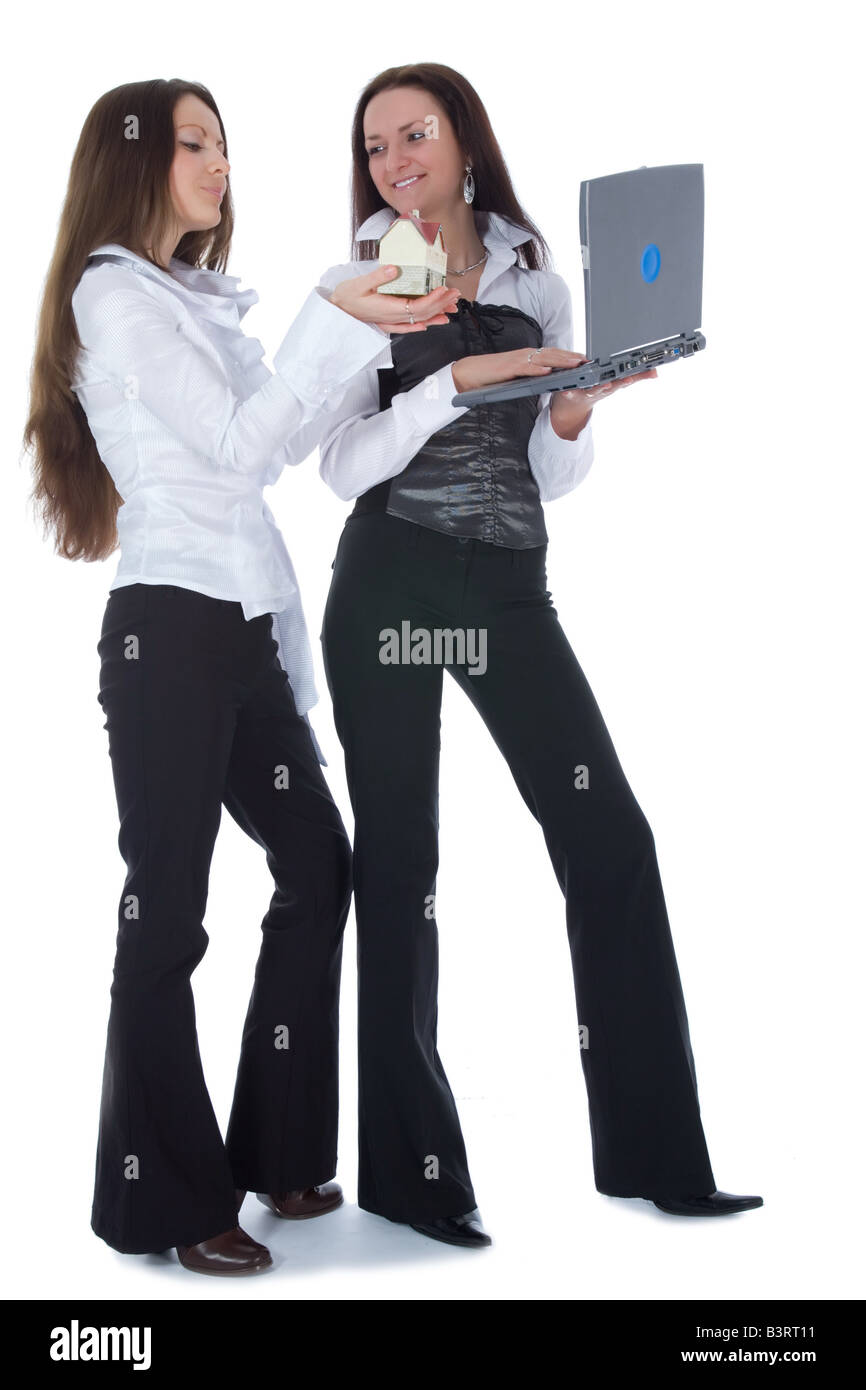 Two business woman advertises real estate on white Stock Photo - Alamy