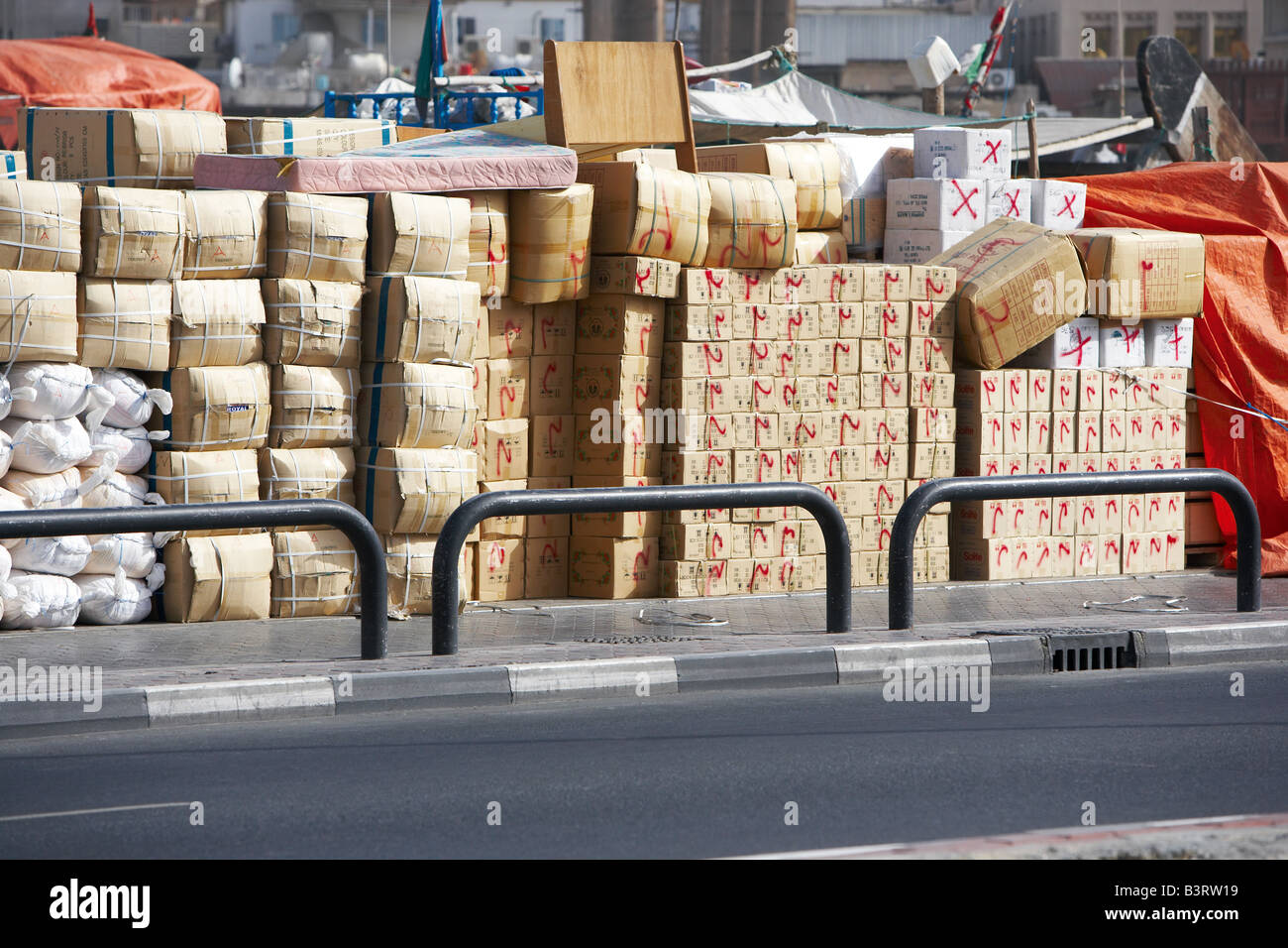 piles of boxes in the port area in dubai united arab emirates Stock Photo Alamy