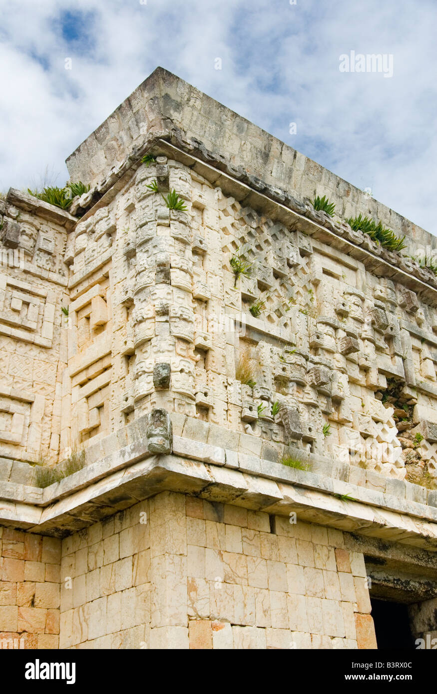Mexico – Jan 19 2007: Puuc carving detail on a corner of The Palace of the Governor, Uxmal Stock Photo