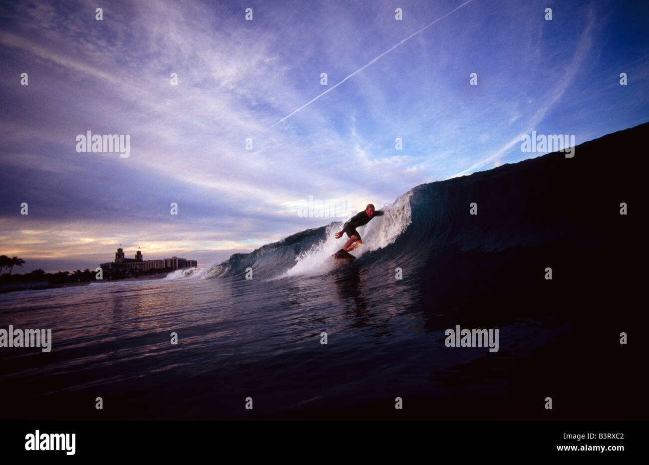 Surfing late in the afternoon off Palm Beach Florida with view of the