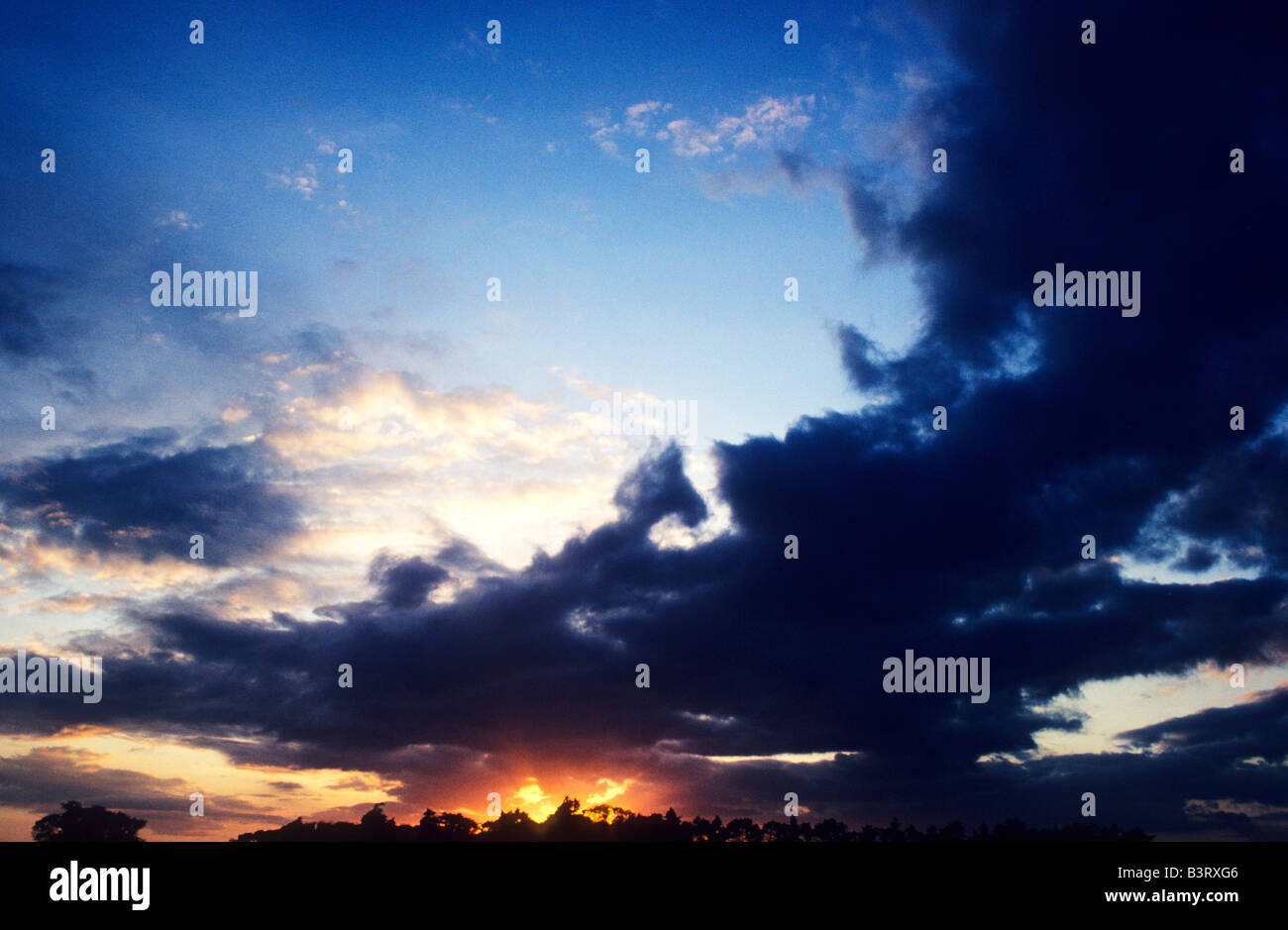 Dark Storm Clouds Sky sunset Stock Photo - Alamy