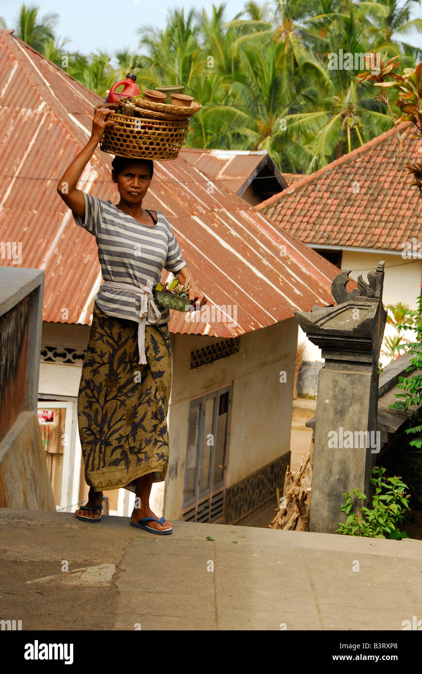 women carrying offerings , julah, bali aga village , north bali , indonesia Stock Photo