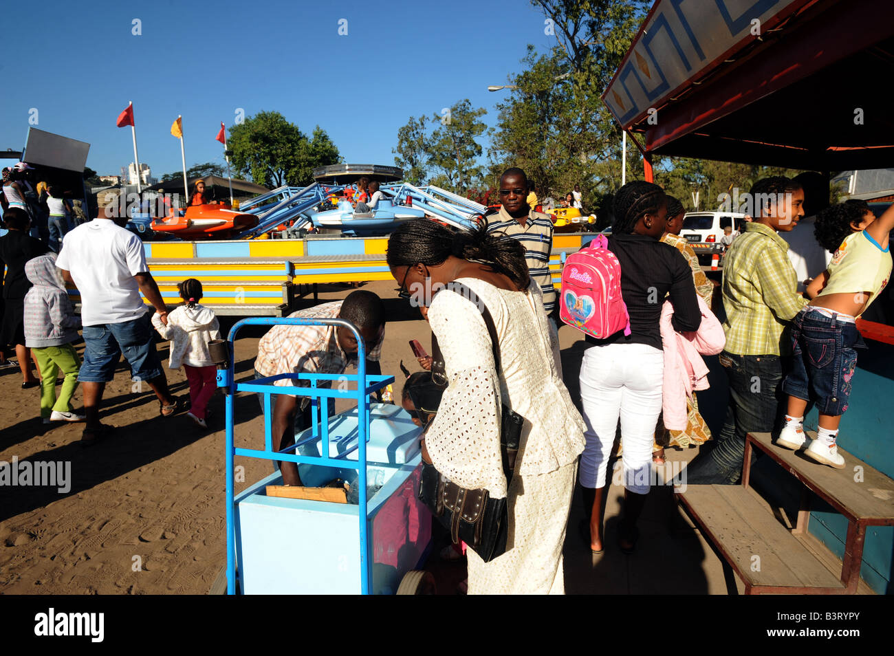 Enjoying rides on the fariground attractions at Feira Popular, Maputo, Mozambique Stock Photo