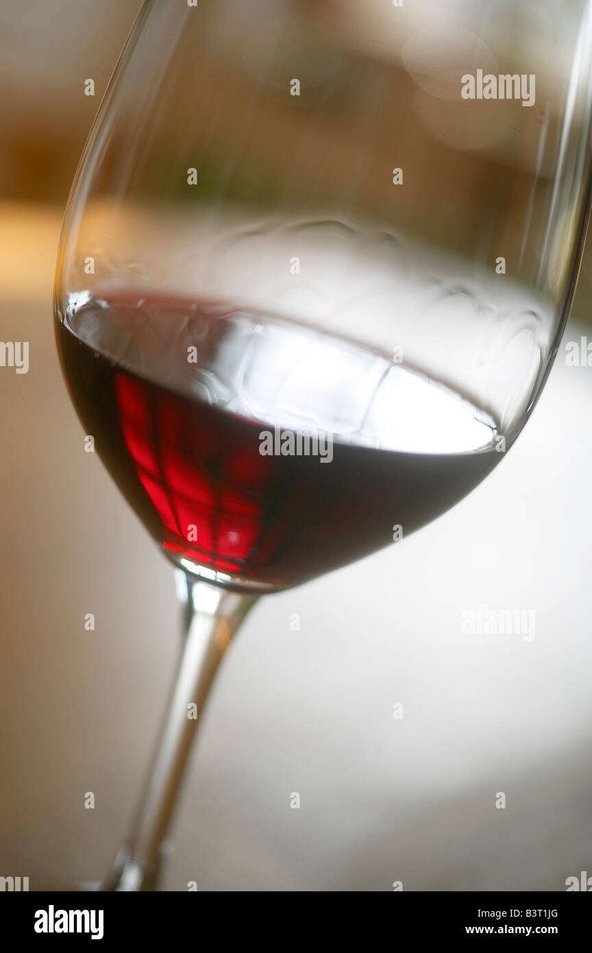 RED WINE GLASS BACKLIT WITH "LEGS Stock Photo Alamy