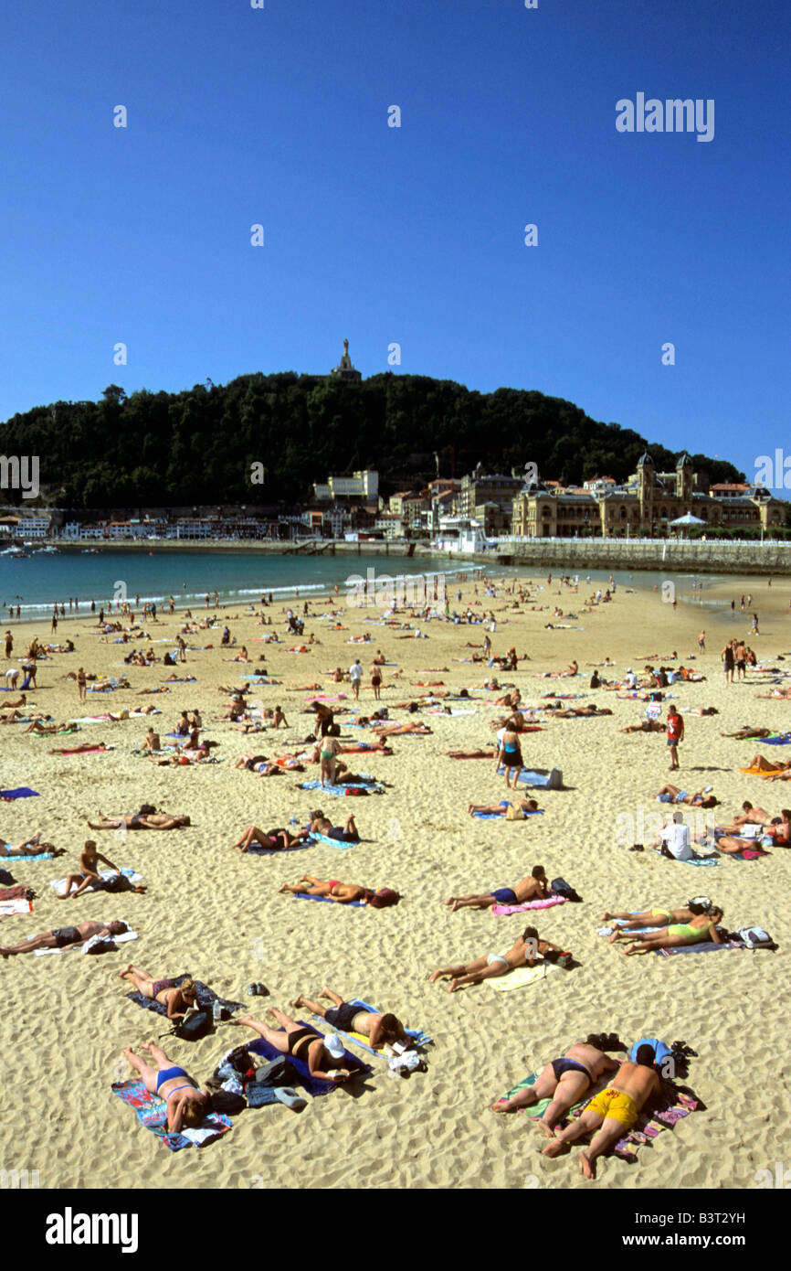 Spain. San Sebastian's greatest blessing is La Concha beach which is in use one way or another all year round Stock Photo