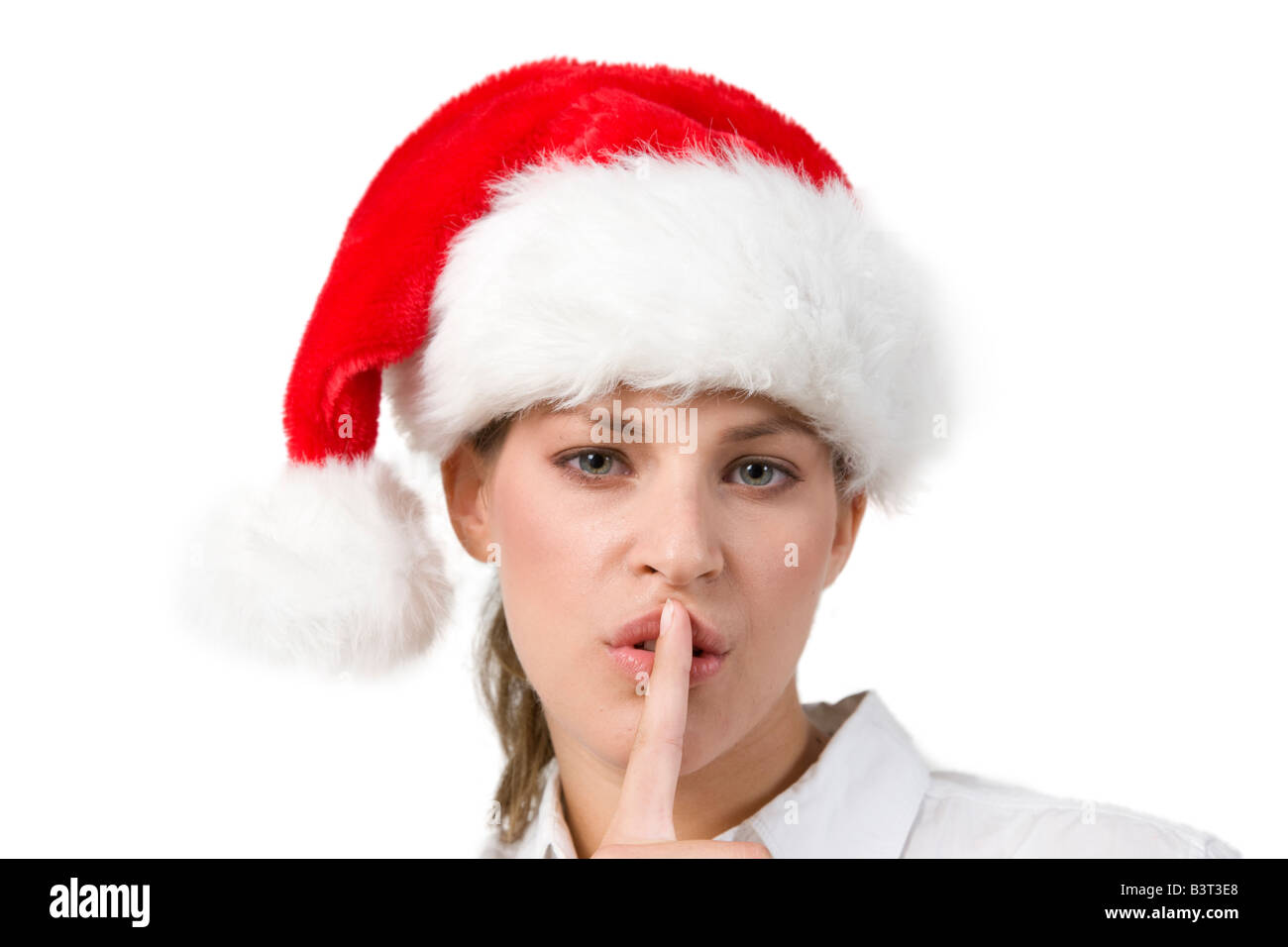 santa woman shushing on white background Stock Photo - Alamy