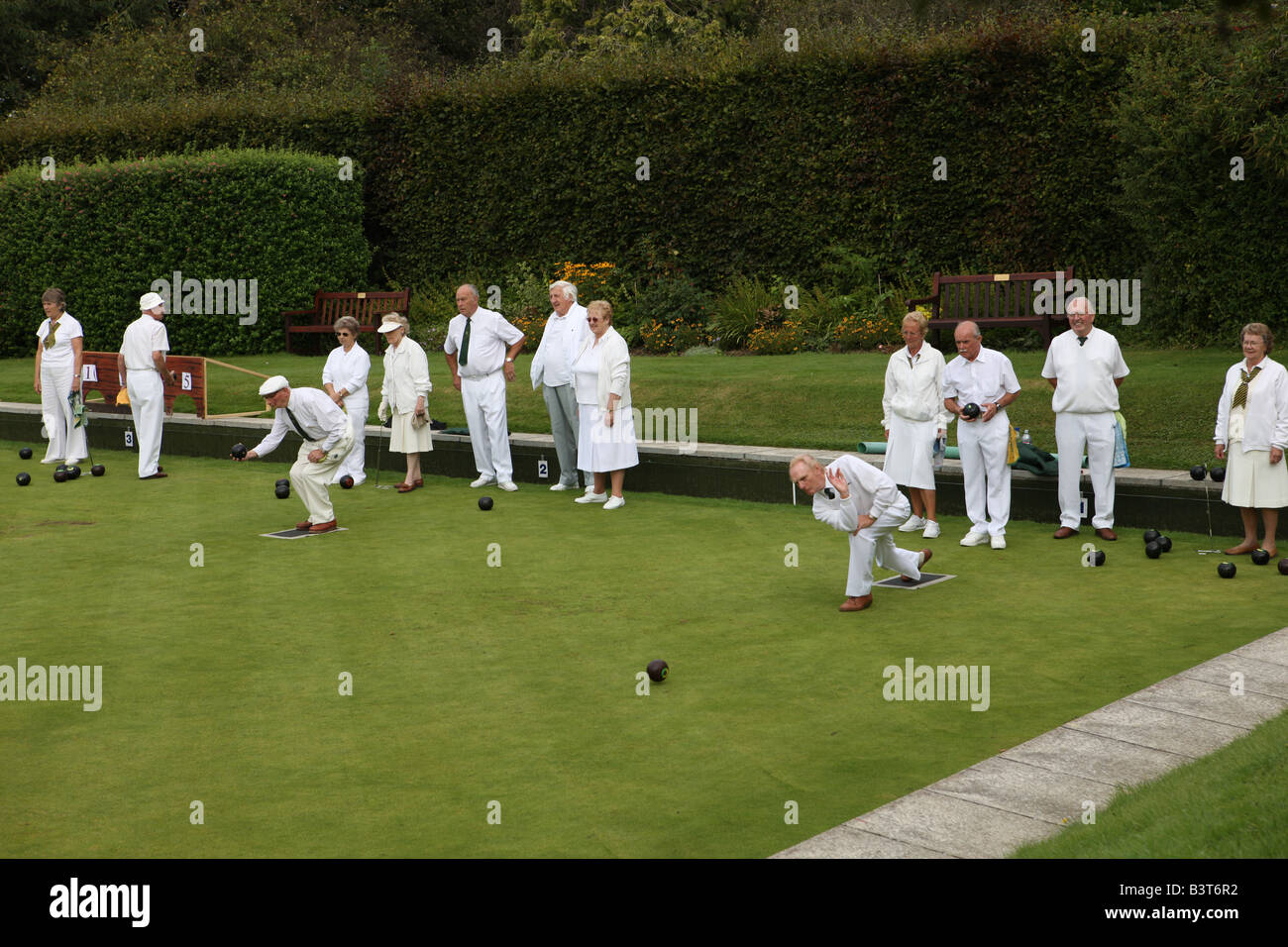 Charity bowls competition in England on a pleasant Sunday afternoon. Stock Photo