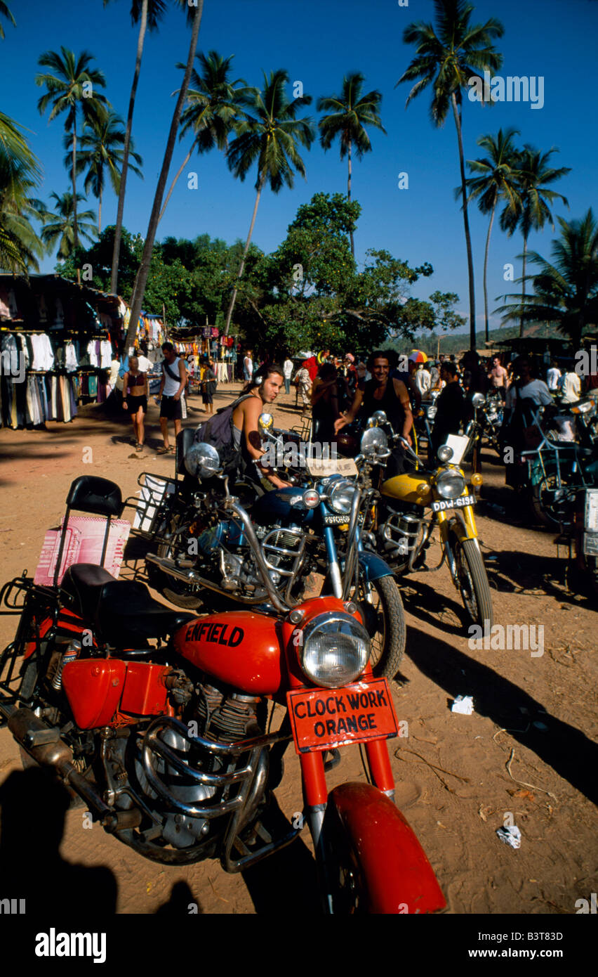 India, Goa, Anjuna. The weekly Anjuna market is one of Goa's most popular for young travellers who are touring India, where they buy second hand Enfield motorbikes Stock Photo