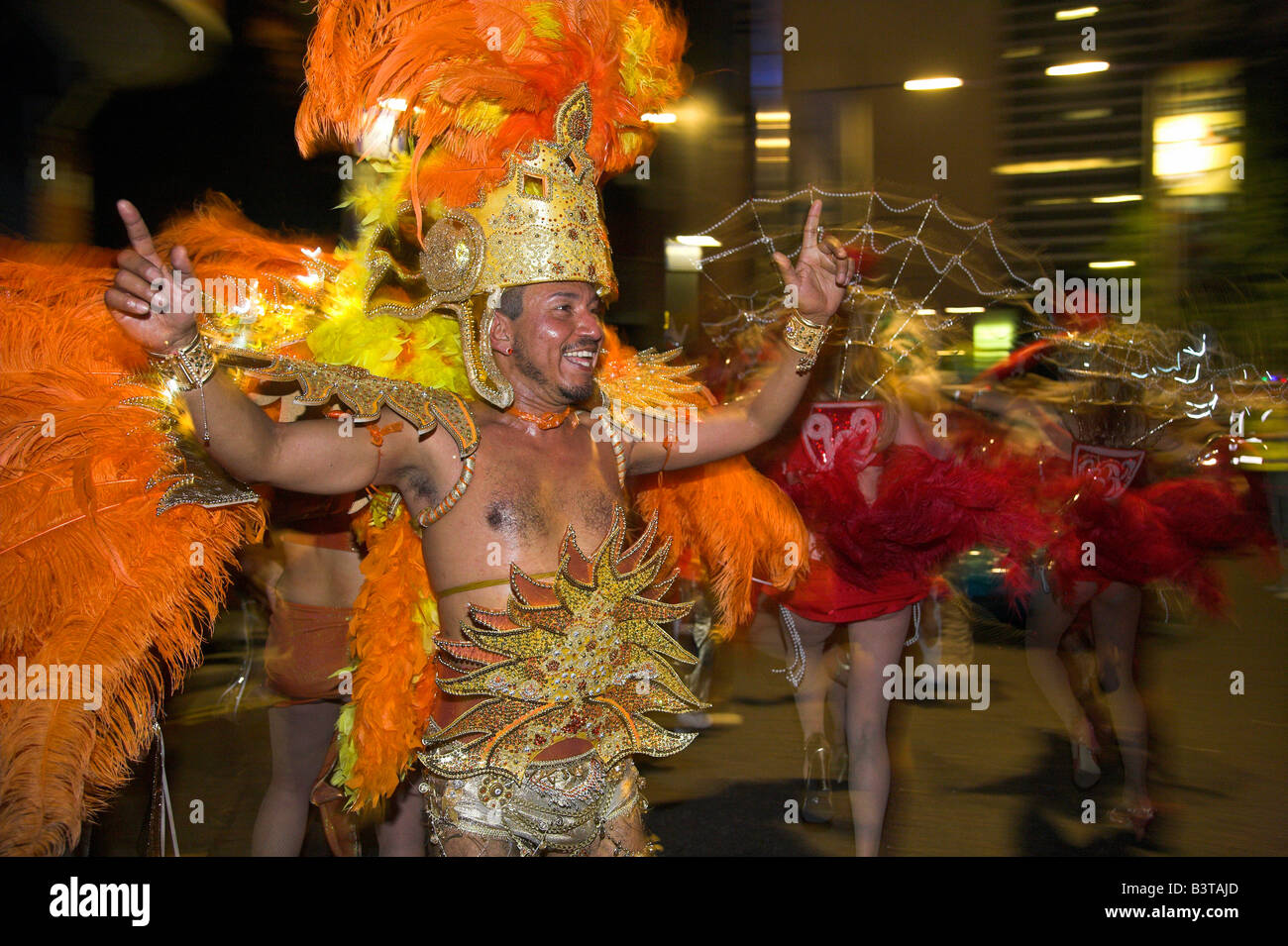 England, London. Colourful costumes on display in the parade during the
