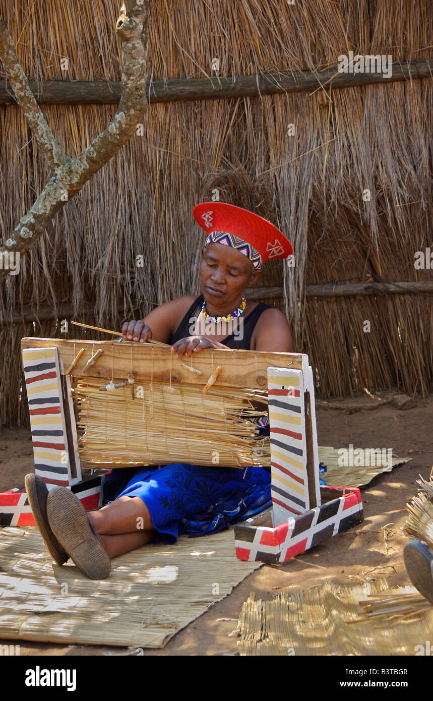 Africa, South Africa, KwaZulu Natal, Shakaland, Zulu woman weaving mats ...