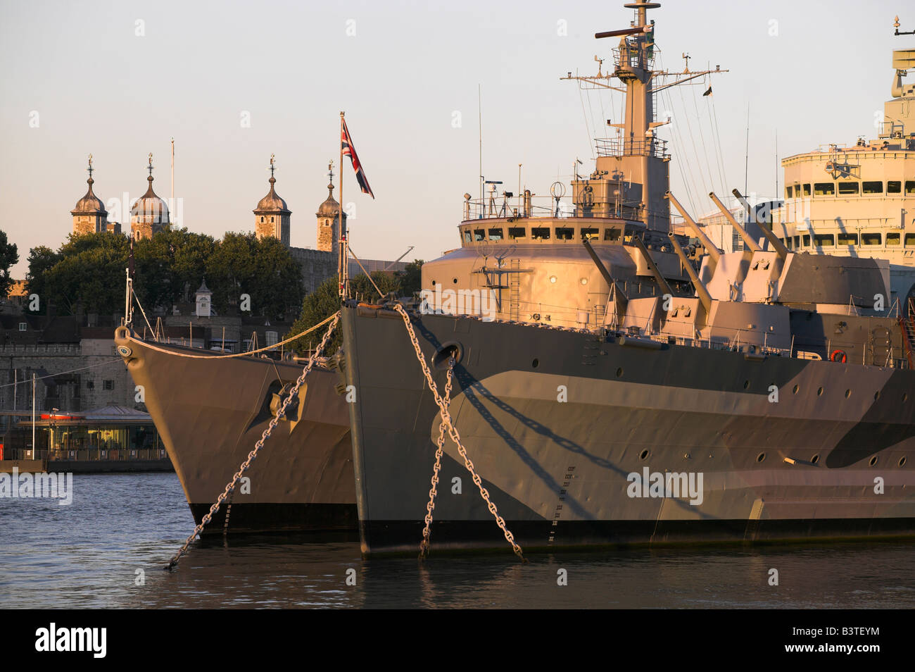 England, London, HMS Belfast, a WW2 battleship now converted into a floating museum, is moored on the Thames near Tower Bridge. Stock Photo