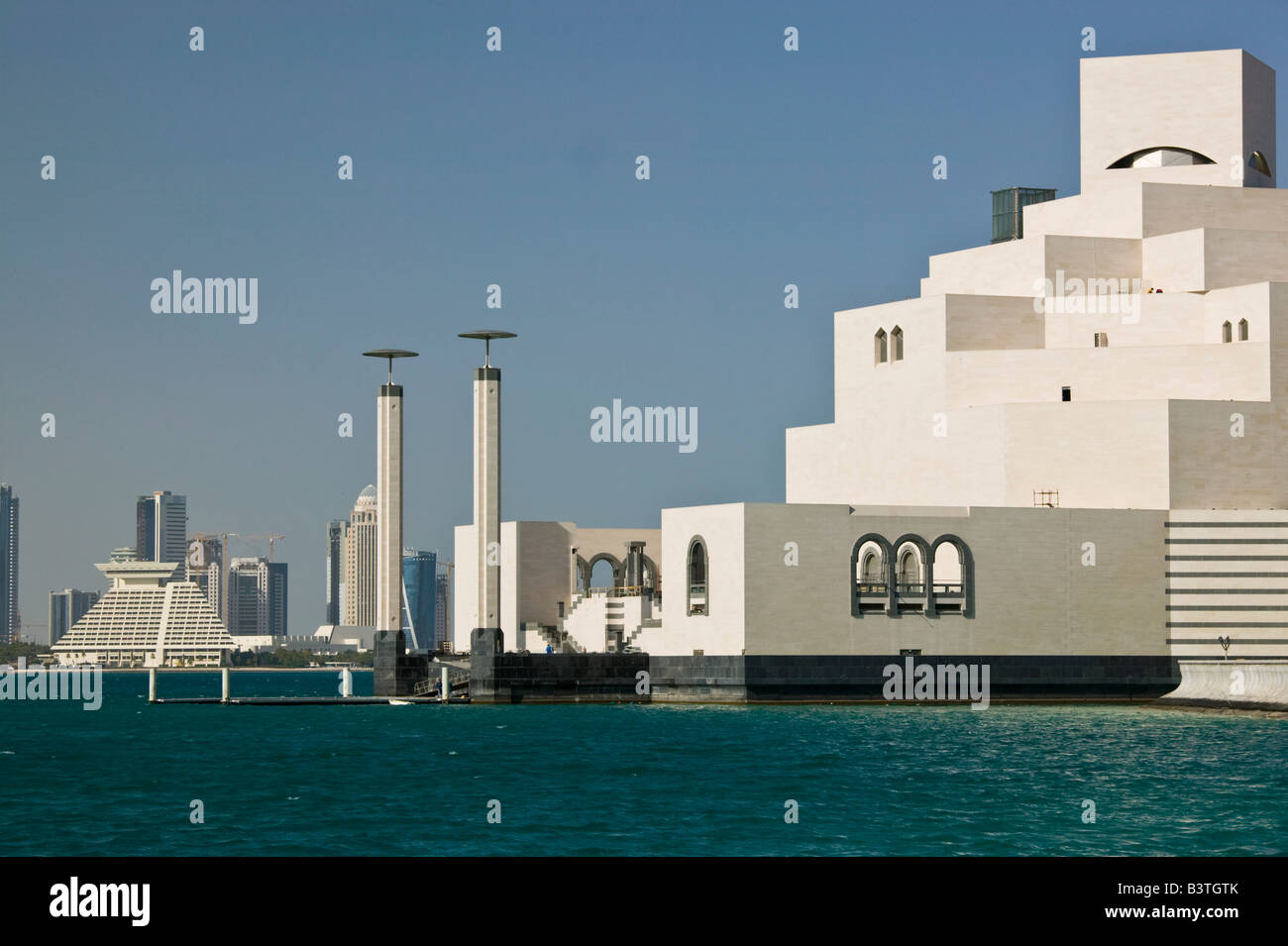 Qatar, Ad Dawhah, Doha. Museum of Islamic Art (Architect: IM Pei) and view towards West Bay Stock Photo