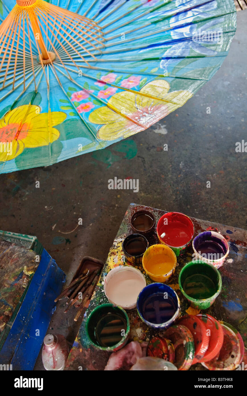 Artist's paints and decorative umbrella, Umbrella Making Center, Bo