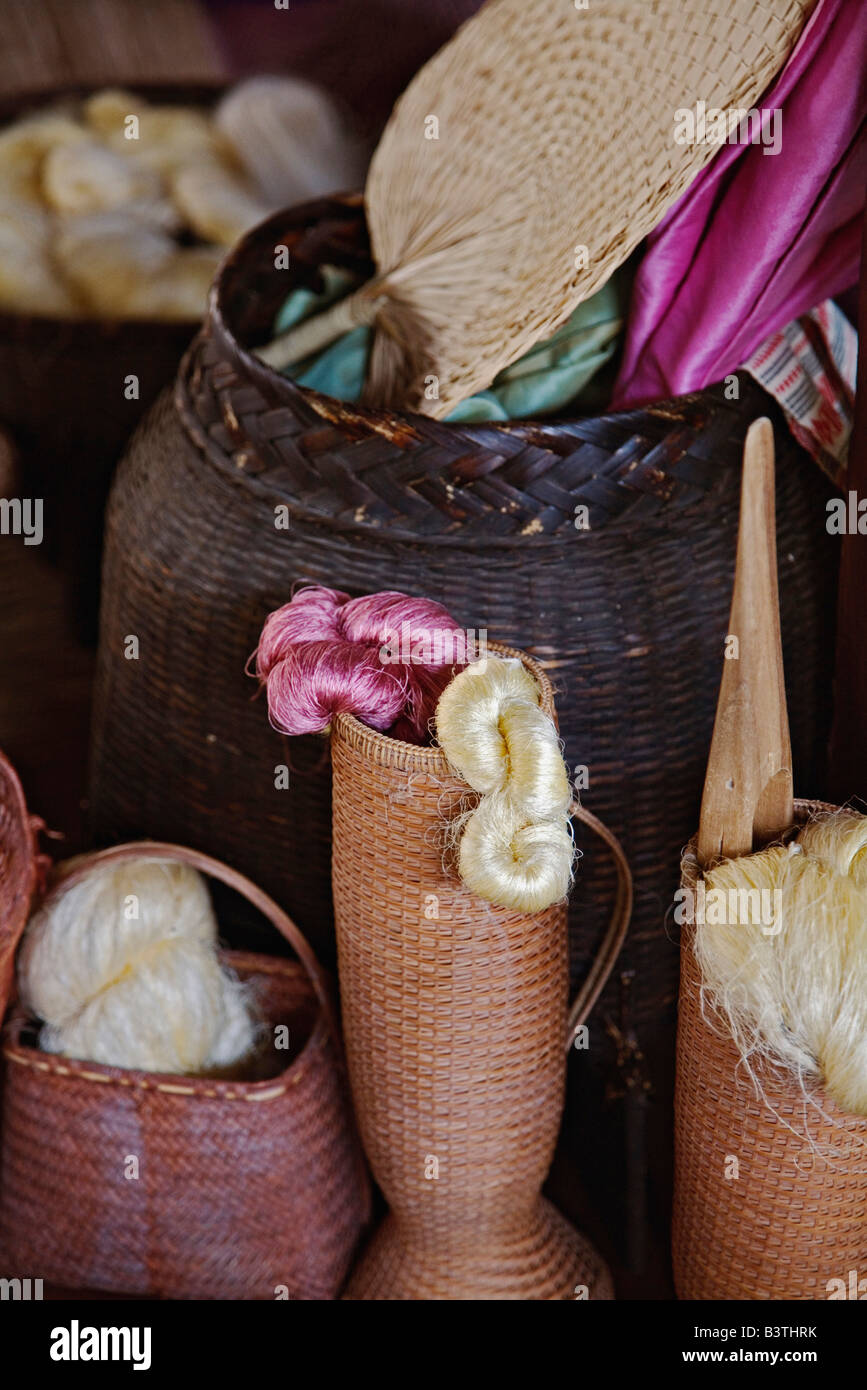 Silk thread and silk material in baskets, Chiang Mai, Thailand Stock Photo