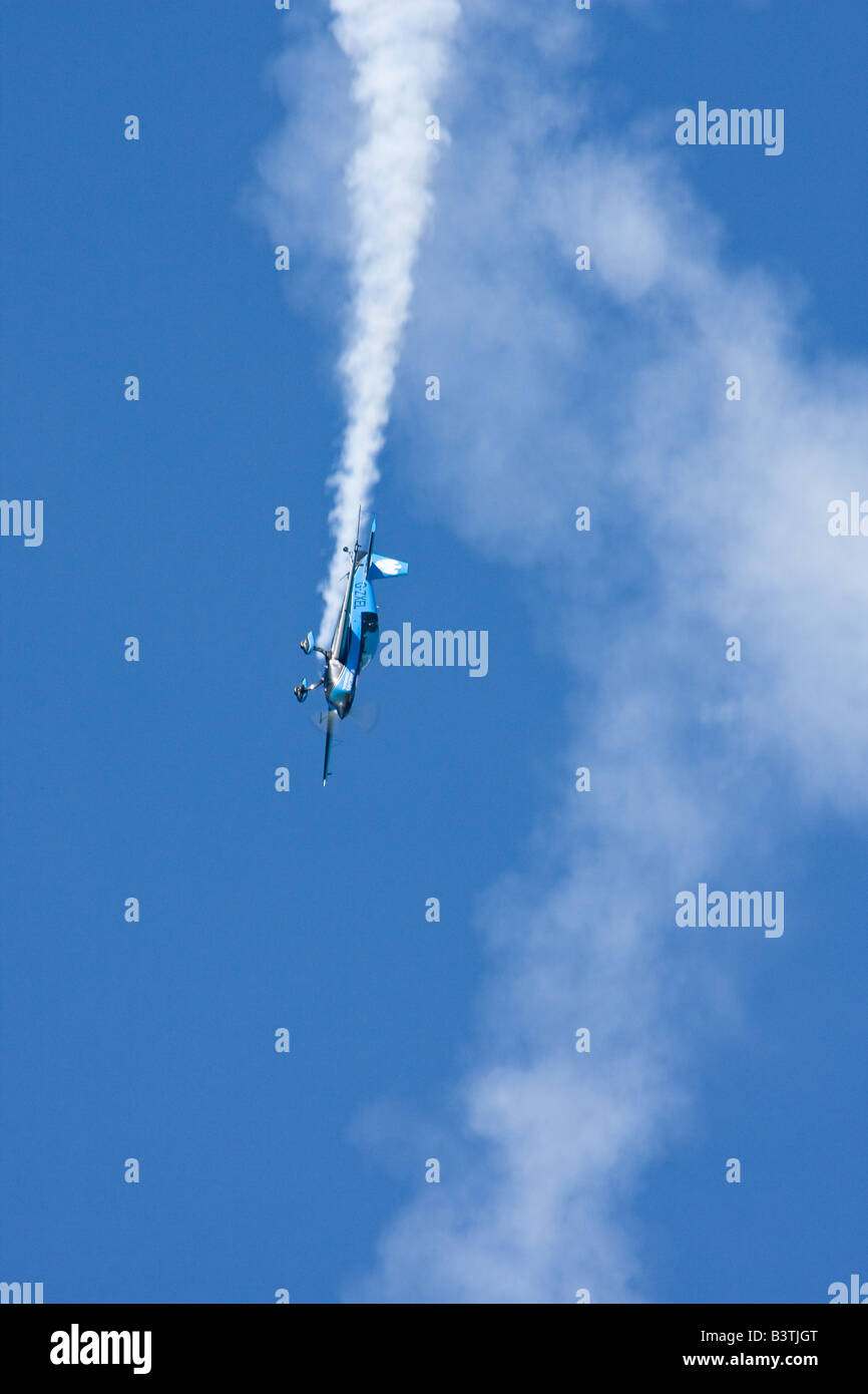 Blades Air display in Extra 300 LP aircraft Stock Photo