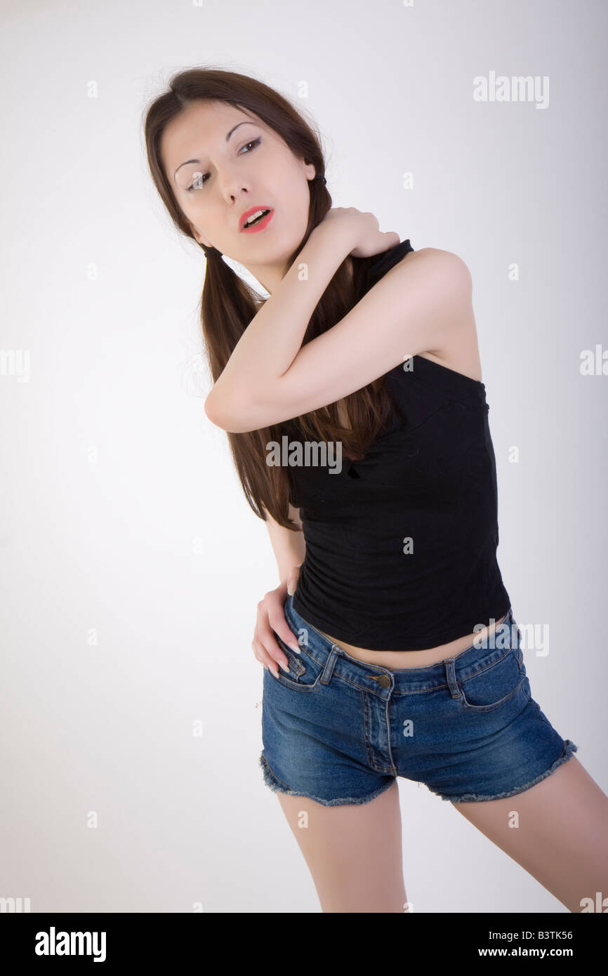 young woman wearing hot pants Stock Photo Alamy