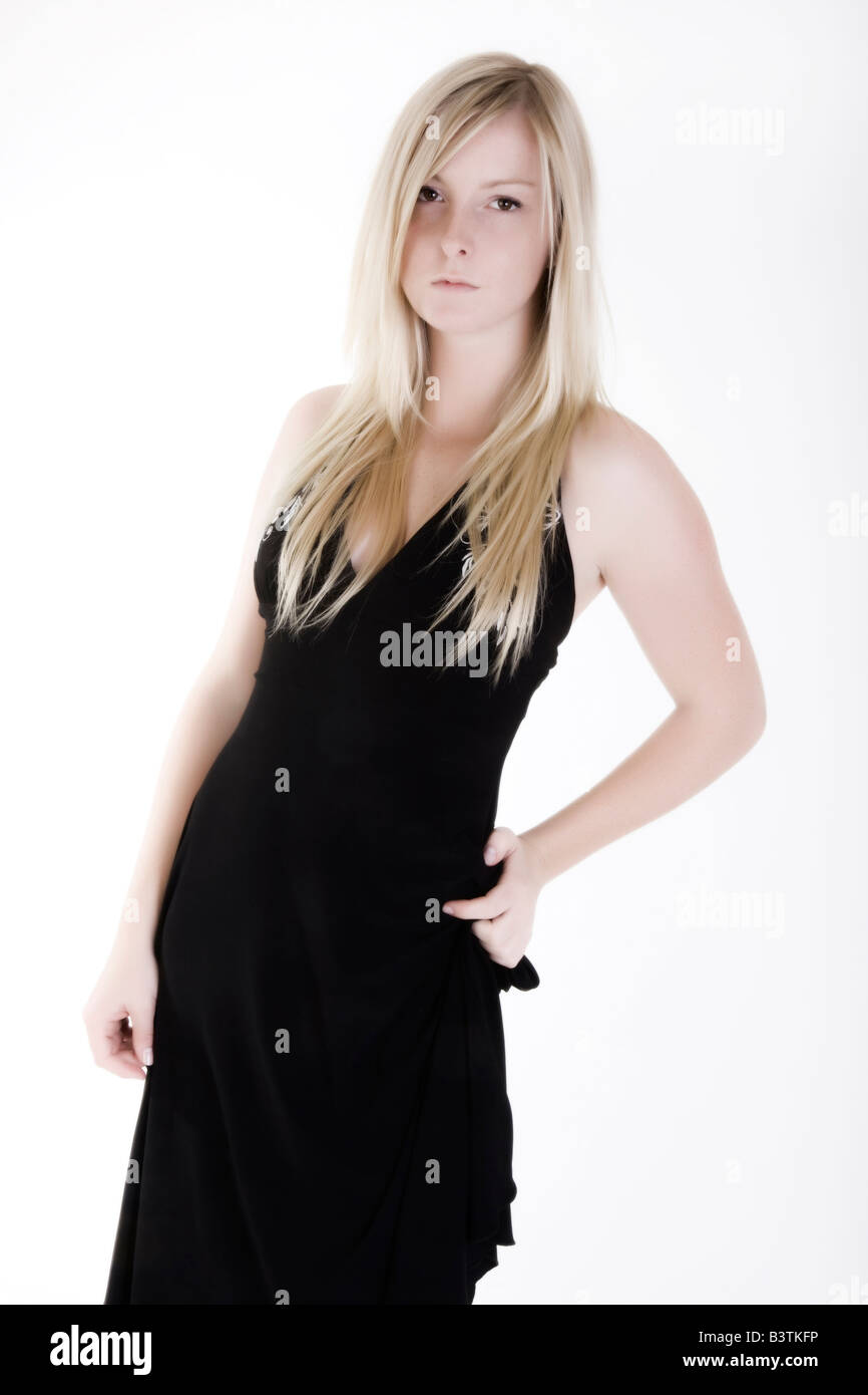 beautiful young woman in fashionable black evening dress Stock Photo ...