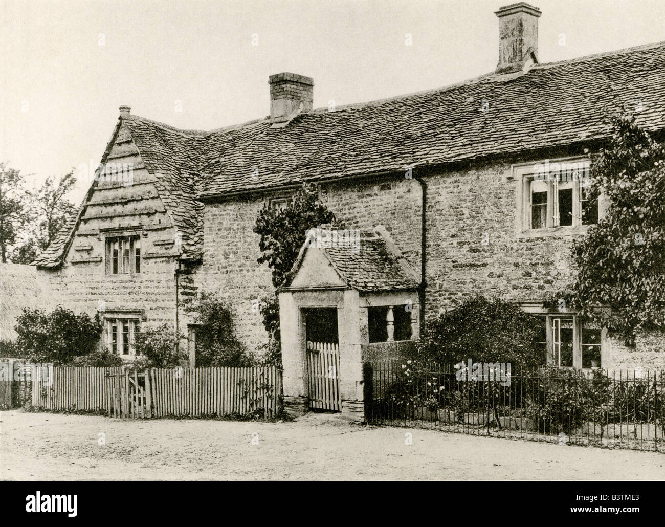 A collotype plate  ' Cottage with Porch, Little Rissington, Glos.' scanned at high resolution from a book published in 1905 Stock Photo