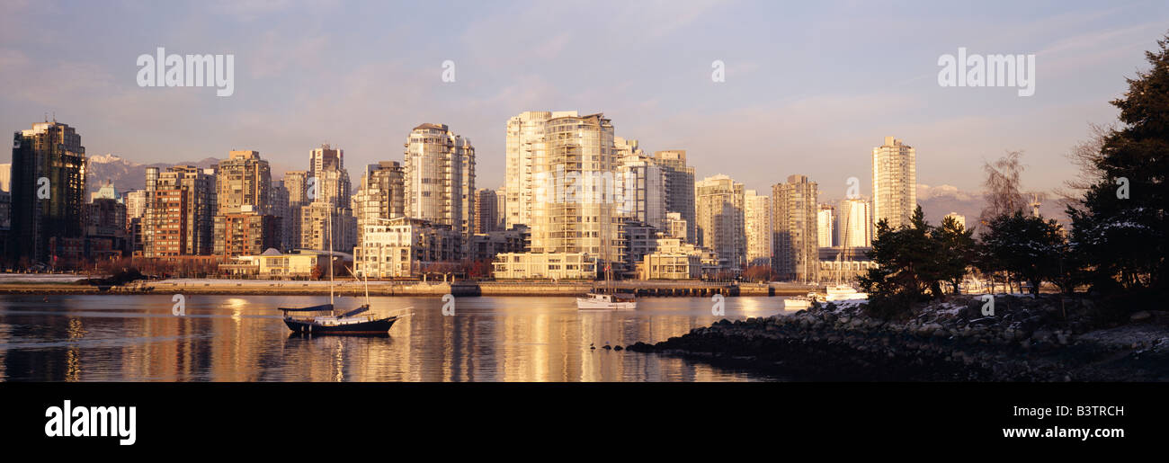 Evening sun on the downtown Vancouver skyline across False Creek from ...