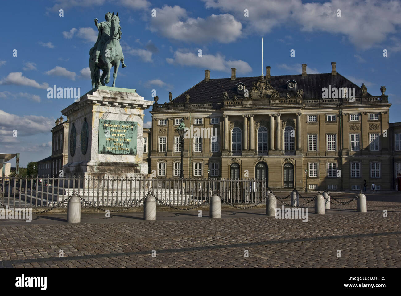 Europe, Denmark, Copenhagen, Amalienborg Palace Square, equestrian statue of King Frederick V and Palace of Christian IX Stock Photo