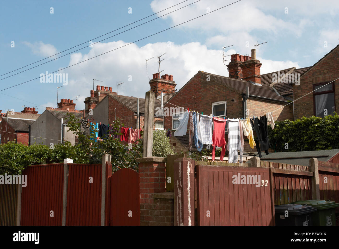 cloths on washing line,back of house,british Stock Photo Alamy
