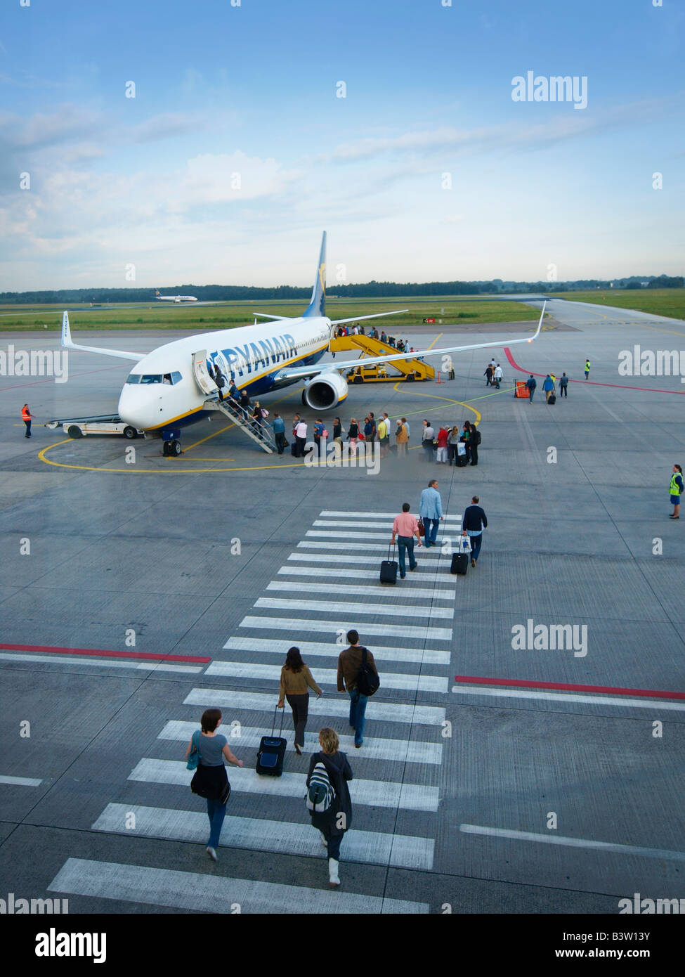 Passengers boarding a Ryanair Boeing 737 jet airliner at Eindhoven Airport the Netherlands Stock Photo