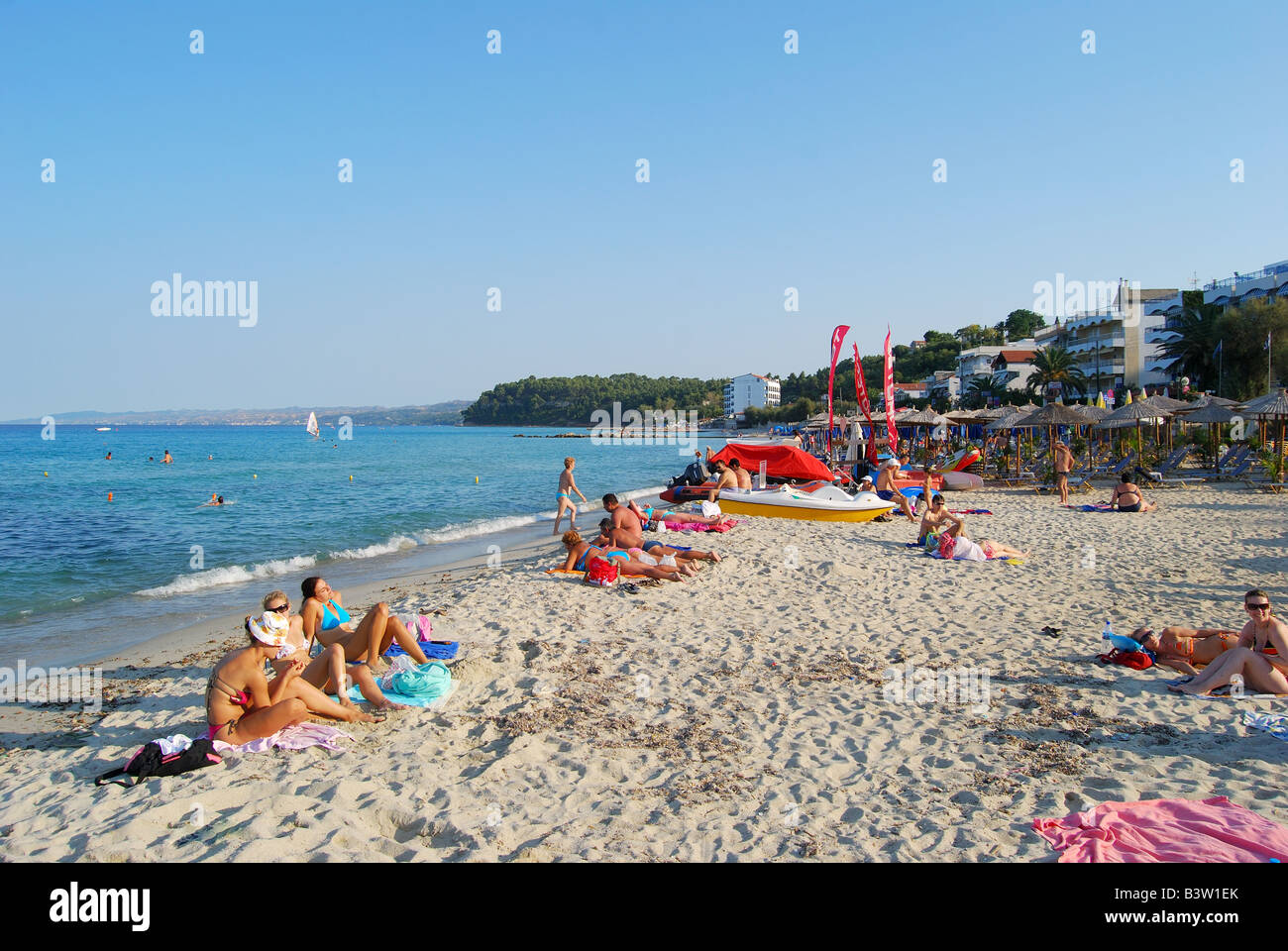 Beach view at sunset, Kallithea, Kassandra Peninsula, Chalkidiki (Halkidiki), Central Macedonia, Greece Stock Photo