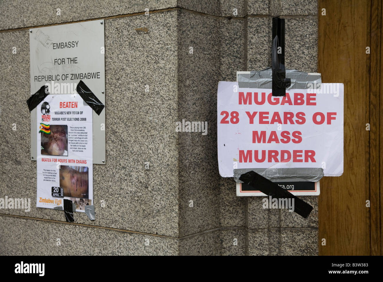 Anti-Mugabe posters on the Zimbabwean Embassy, The Strand, London Stock Photo