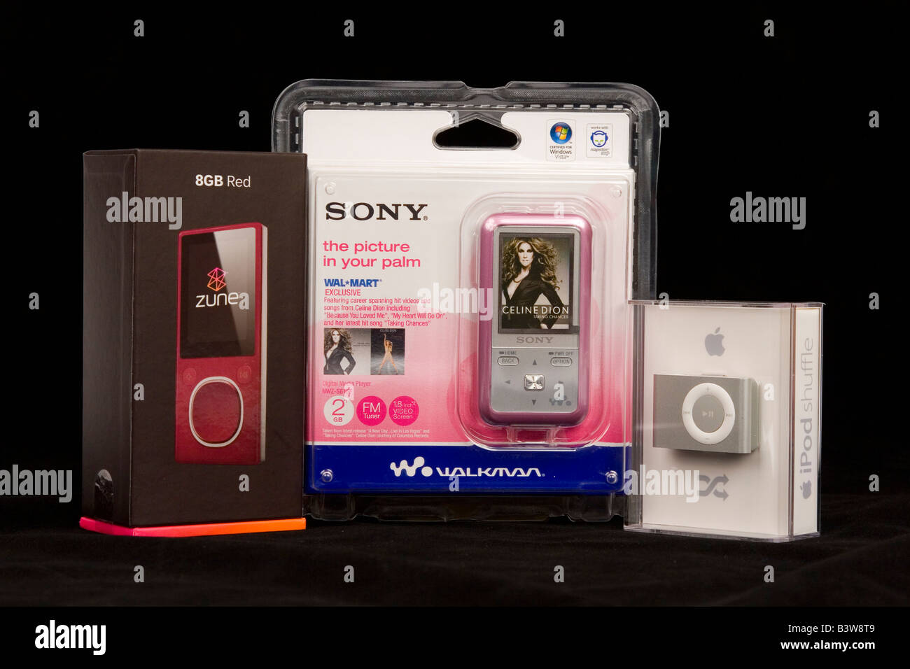 Studio shot of MP3 players: IPod Shuffle, Sony Walkman, Zune. Stock Photo