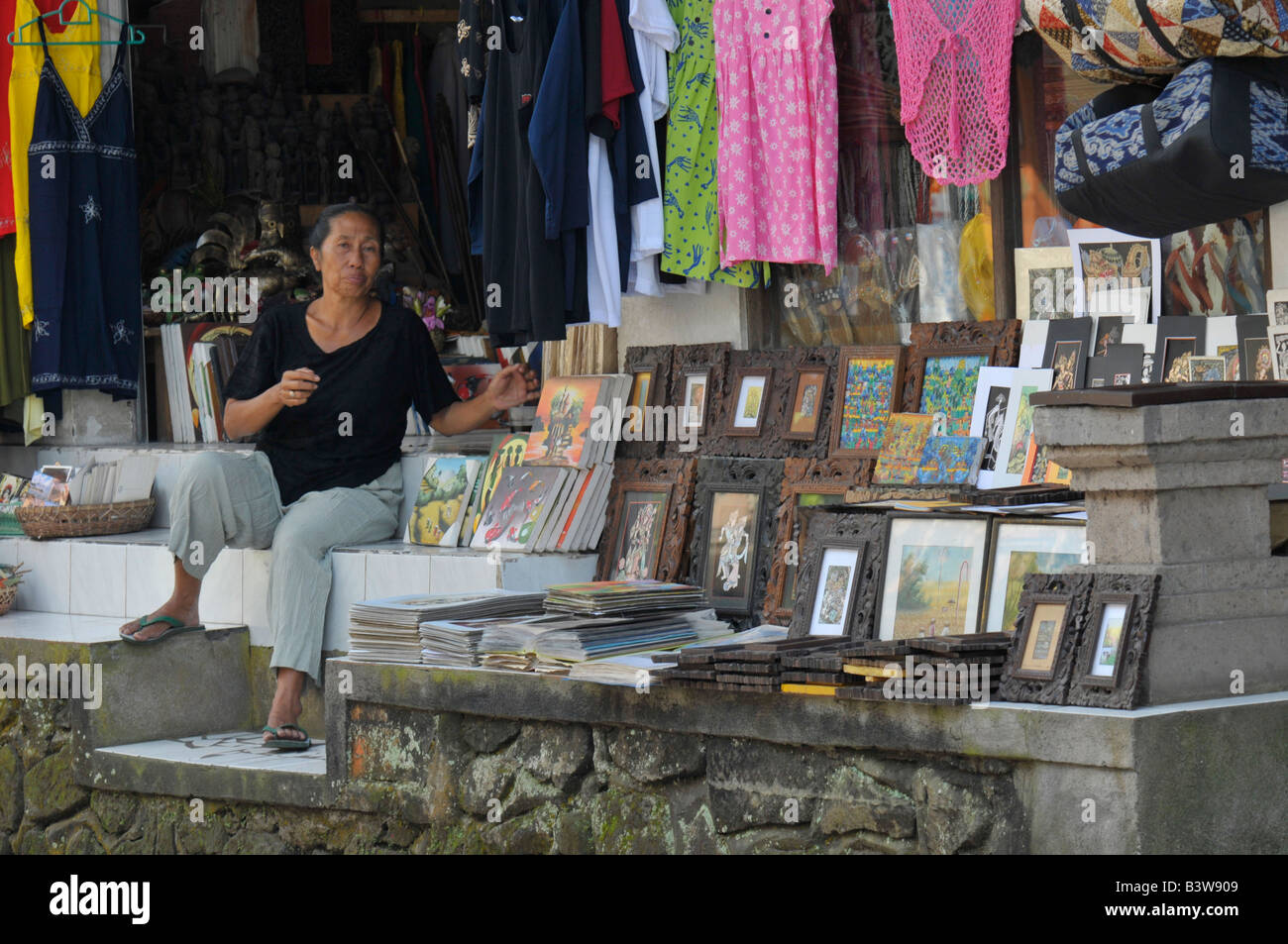 balinese artist in her garden temple and art gallery , traditional and