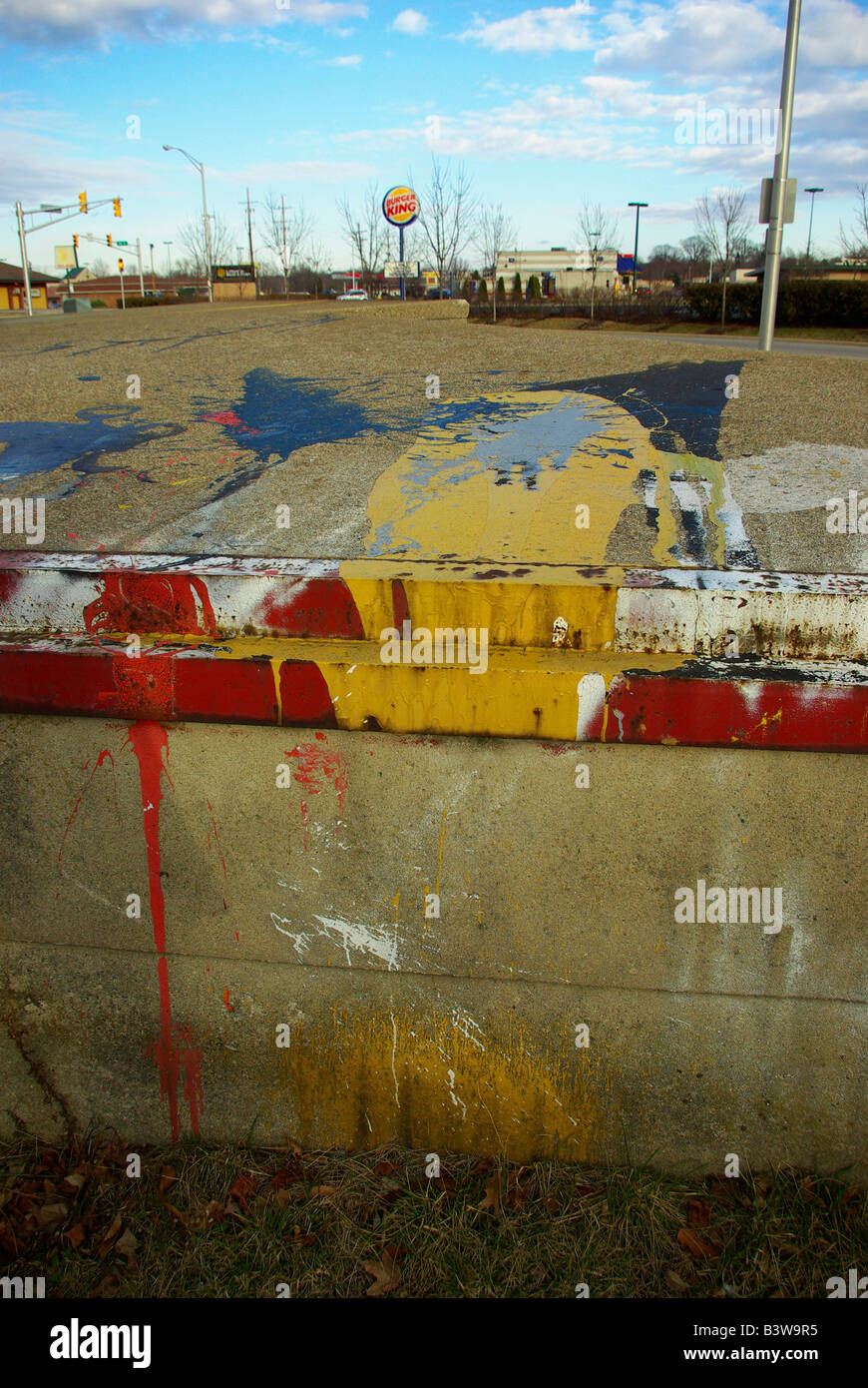 Various colors of paint spilled on a loading dock Stock Photo Alamy