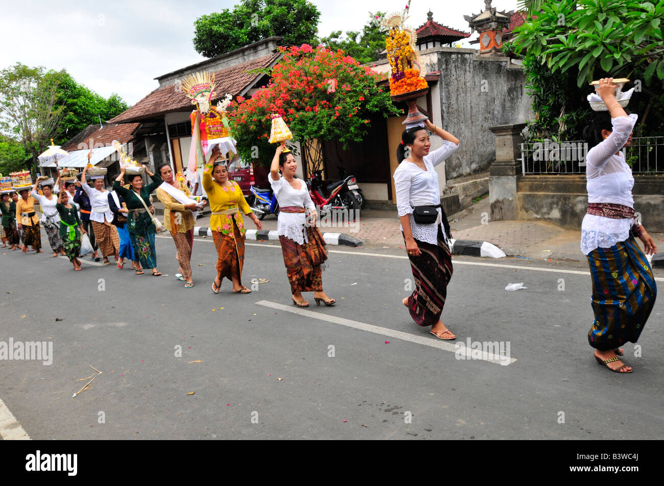 Women Carrying Offerings to Temple Festival (Odalan),mengwi, Bali, Indonesia Stock Photo