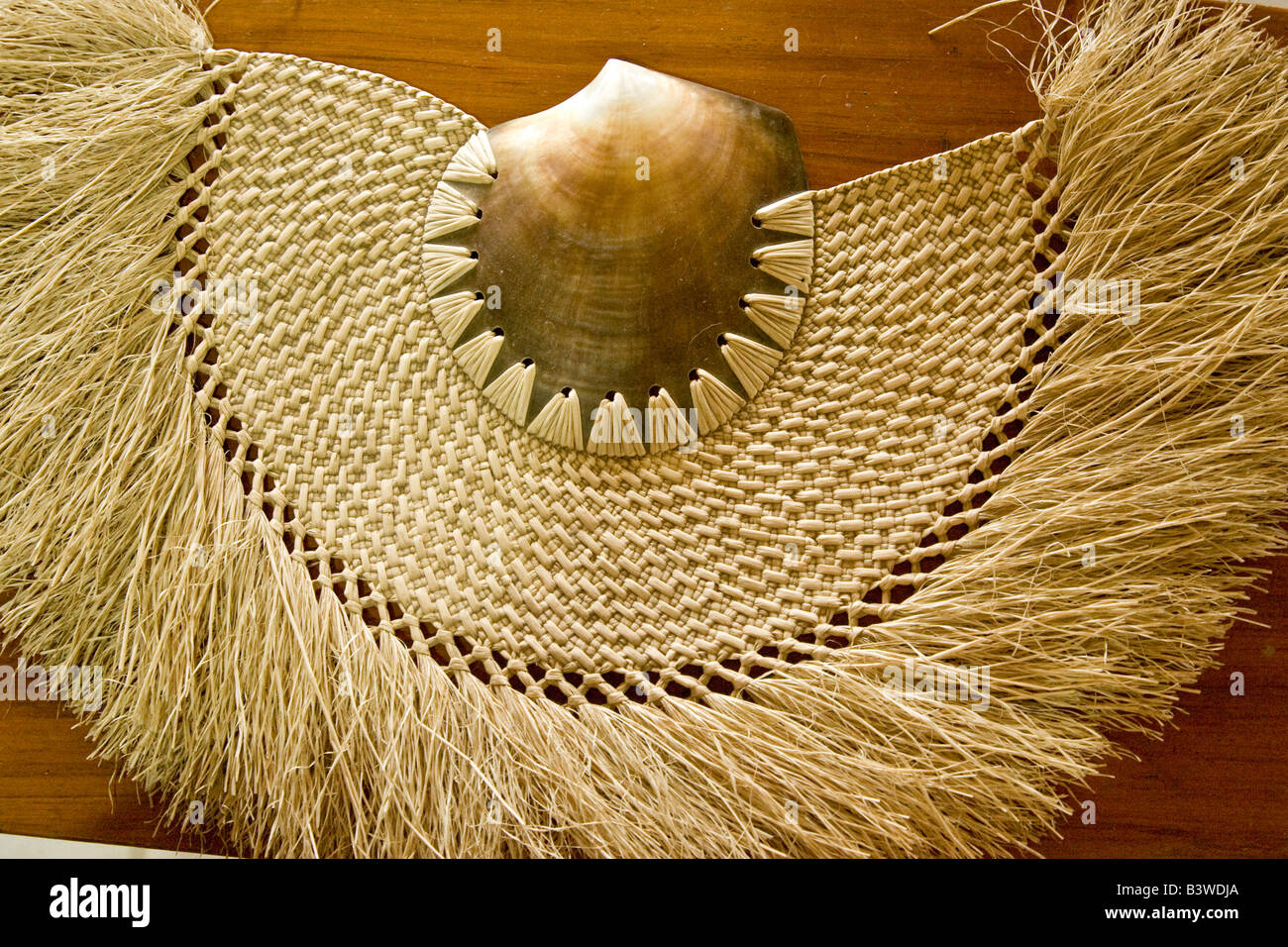 Oceania, Fiji, Lautoka. Traditional fan made of woven grass and shell. Stock Photo