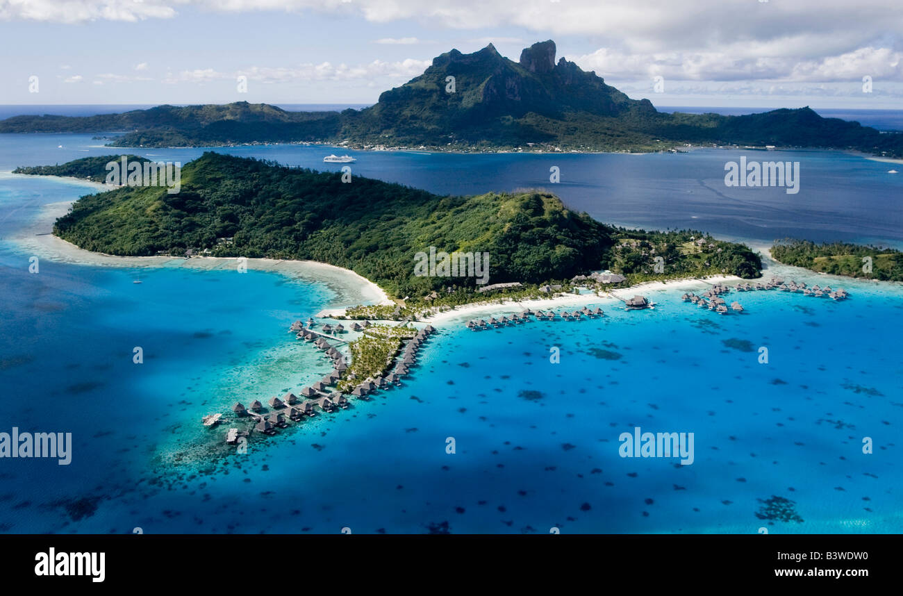 Oceania, French Polynesia, Bora Bora. Aerial view of islands with Paul Gaugin cruise ship in background. Stock Photo